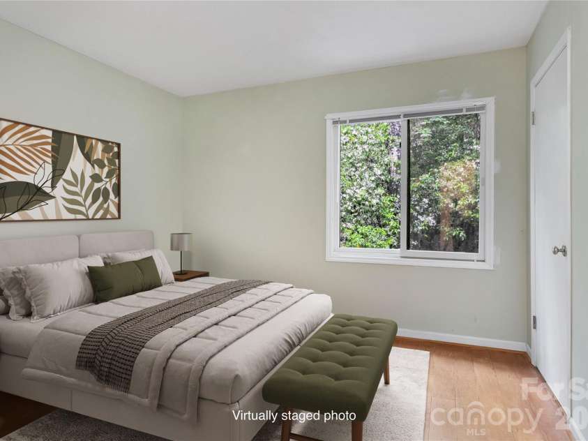 56 Guque Court, Brevard, NC 28712.  MLS# CAR4391612, YatesRealty ID 30909. Virtually Staged Main Floor Guest Bedroom