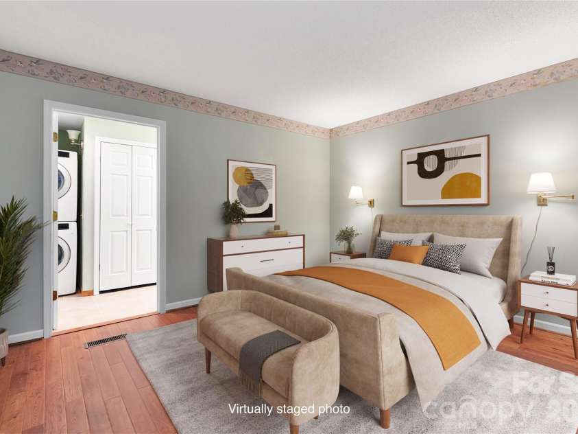 56 Guque Court, Brevard, NC 28712.  MLS# CAR4391612, YatesRealty ID 30909. Virtually Staged Primary Suite