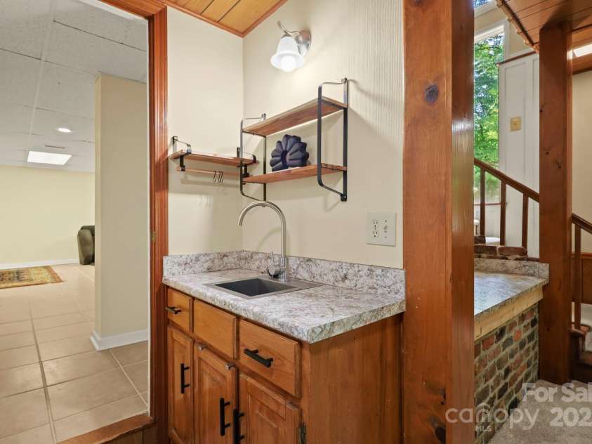 874 Cherokee Place, Lenoir, NC 28645.  MLS# CAR4288568, YatesRealty ID 30909. Den Sink Area