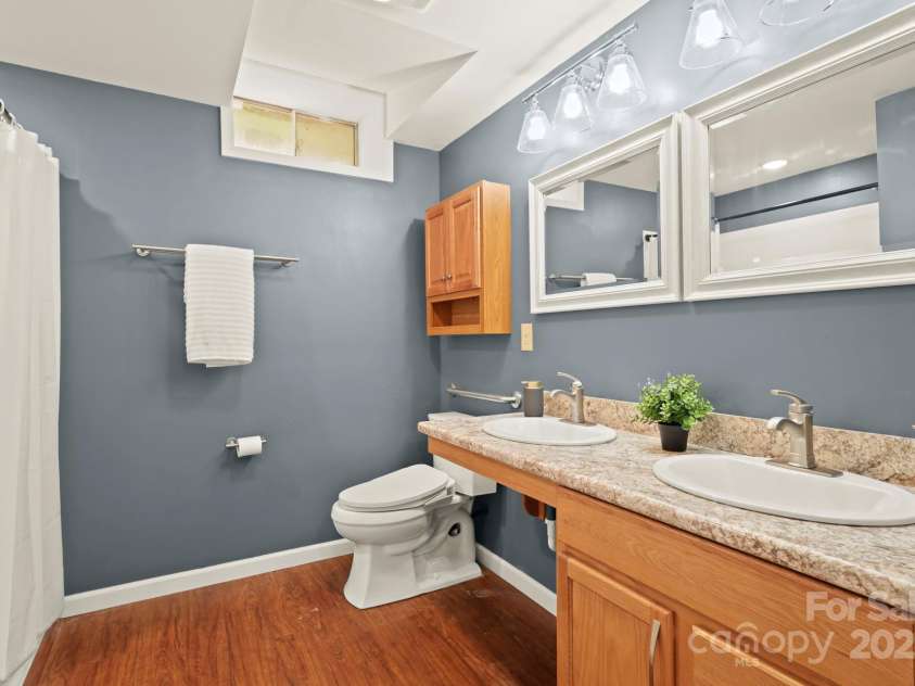 874 Cherokee Place, Lenoir, NC 28645.  MLS# CAR4288568, YatesRealty ID 30909. Full Basement Bathroom