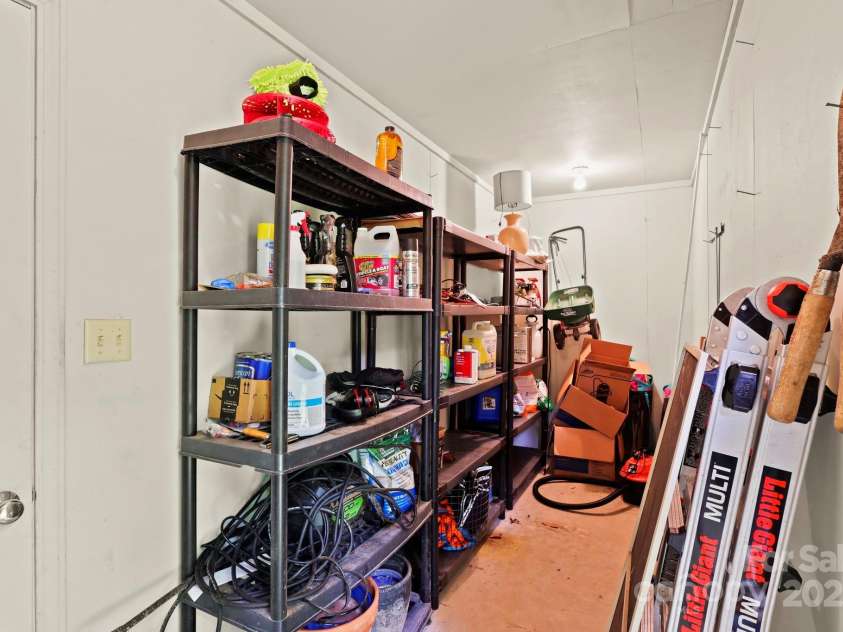 874 Cherokee Place, Lenoir, NC 28645.  MLS# CAR4288568, YatesRealty ID 30909. Utility Closet Off Garage