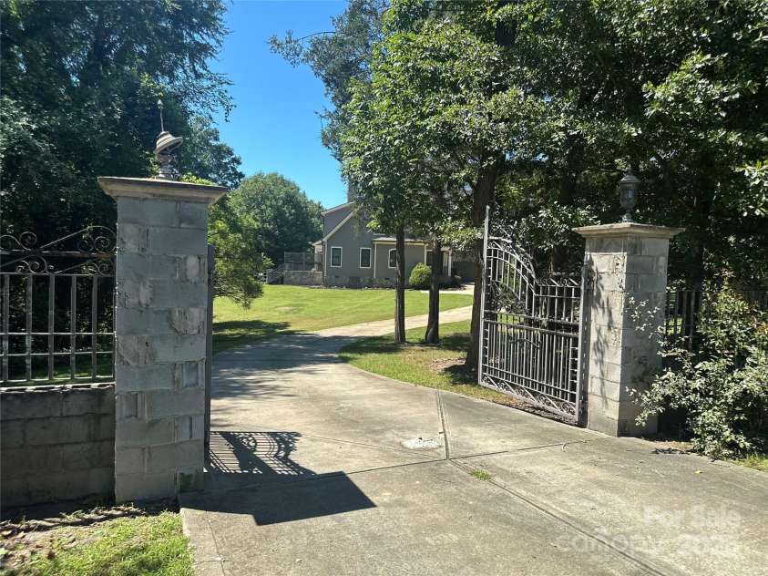 1132 Mt Holly Huntersville Road, Charlotte, NC 28214.  MLS# CAR4298460, YatesRealty ID 3091. Welcome to your new sanctuary!