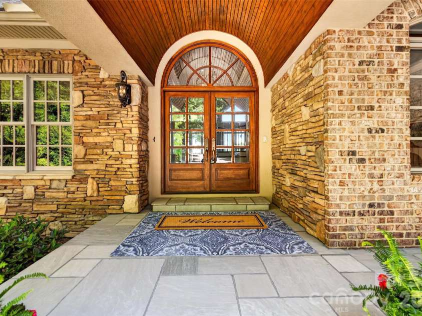 1440 Langdon Road, Sherrills Ford, NC 28673.  MLS# CAR4382448, YatesRealty ID 30910. Front exterior at twilight