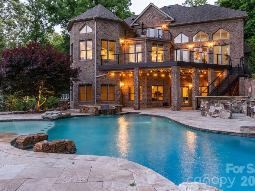1440 Langdon Road, Sherrills Ford, NC 28673.  MLS# CAR4382448, YatesRealty ID 30910. Pool at twilight