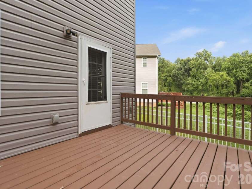 143 High Bluff Circle, Mooresville, NC 28115.  MLS# CAR4391927, YatesRealty ID 30918. Deck Off Kitchen - Ideal for Entertaining!