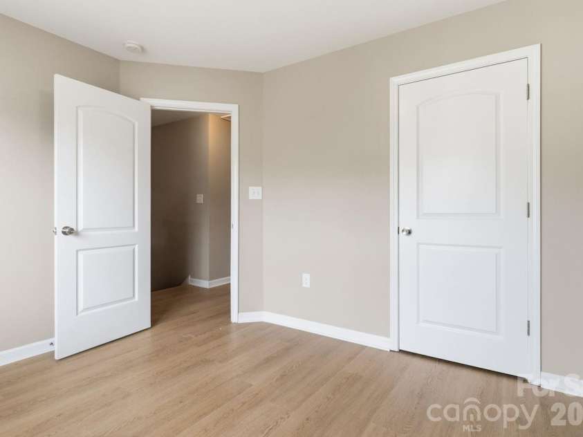 143 High Bluff Circle, Mooresville, NC 28115.  MLS# CAR4391927, YatesRealty ID 30918. Front Bedroom