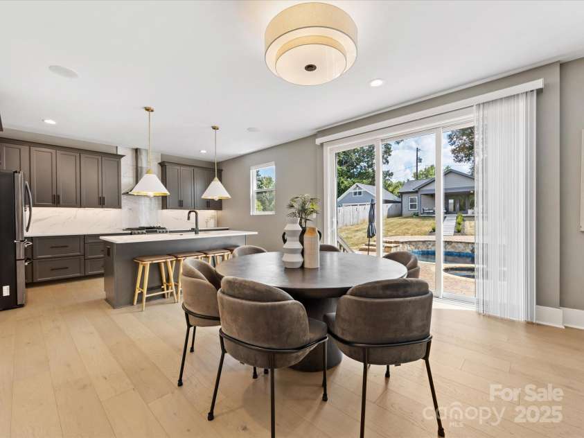 2208 Parson Street, Charlotte, NC 28205.  MLS# CAR4282025, YatesRealty ID 30926. Dining room with upgraded chandelier lighting