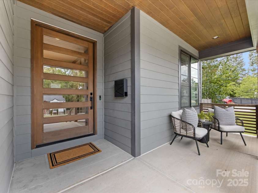 2208 Parson Street, Charlotte, NC 28205.  MLS# CAR4282025, YatesRealty ID 30926. Eye catching custom front door wih sitting area on front porch