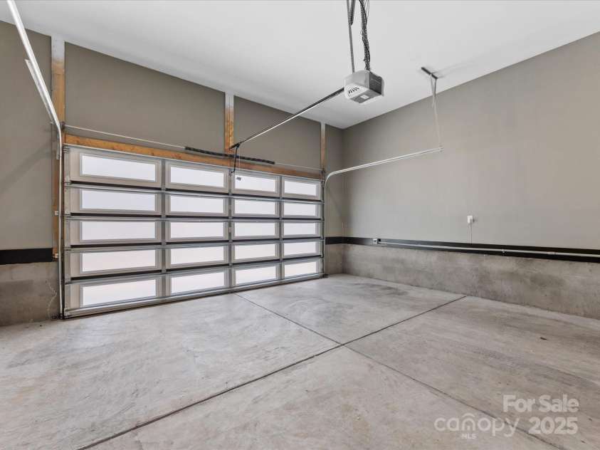 2208 Parson Street, Charlotte, NC 28205.  MLS# CAR4282025, YatesRealty ID 30926. Large two car garage with EV charging station