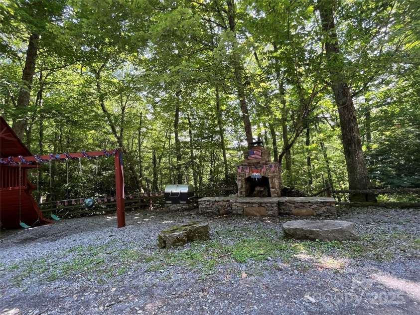 67 Sky Drive, Maggie Valley, NC 28751.  MLS# CAR4275781, YatesRealty ID 30929. Neighborhood outdoor kitchen