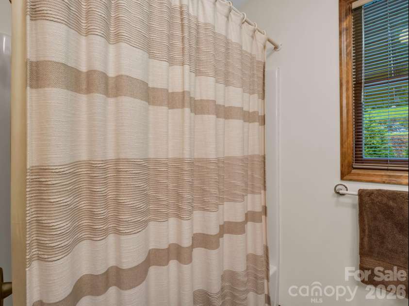 182 Resada Drive, Brevard, NC 28712.  MLS# CAR4390799, YatesRealty ID 30930. 