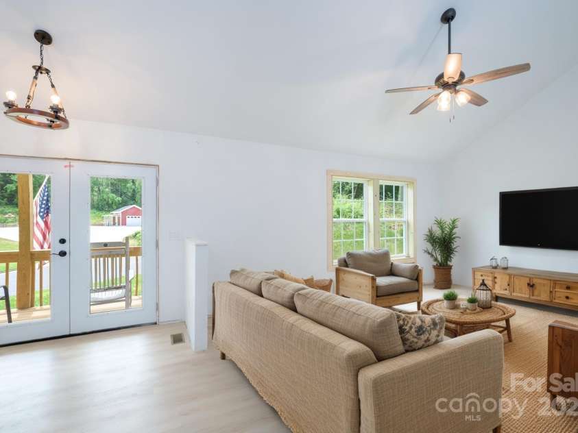 1036 Williamsburg Drive, Lenoir, NC 28645.  MLS# CAR4274477, YatesRealty ID 30931. Virtual staging in living room.