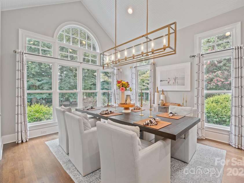 176 Old Post Road, Mooresville, NC 28117.  MLS# CAR4284694, YatesRealty ID 30932. Another view from dining area of private wooded backyard.