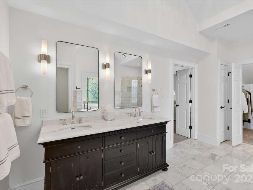 7007 Golden Rain Court, Charlotte, NC 28277.  MLS# CAR4288408, YatesRealty ID 30936. Dual Sink Vanity and beautiful stonework