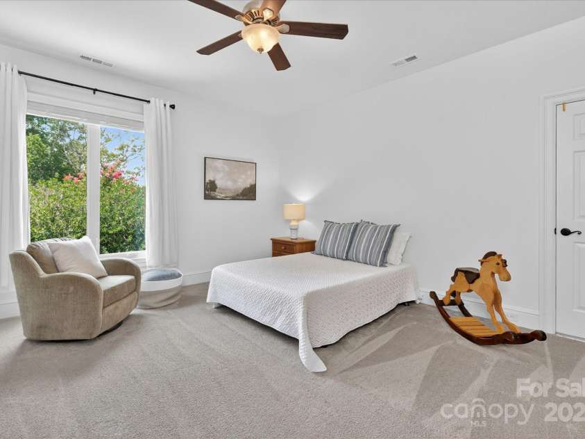 7007 Golden Rain Court, Charlotte, NC 28277.  MLS# CAR4288408, YatesRealty ID 30936. Large Secondary Bedroom with two Storage Closets