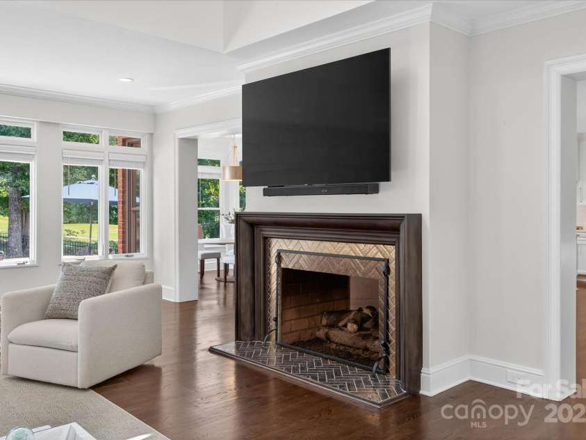 7007 Golden Rain Court, Charlotte, NC 28277.  MLS# CAR4288408, YatesRealty ID 30936. Pass through gas Fireplace that fronts both the Great Room and the Kitchen areas