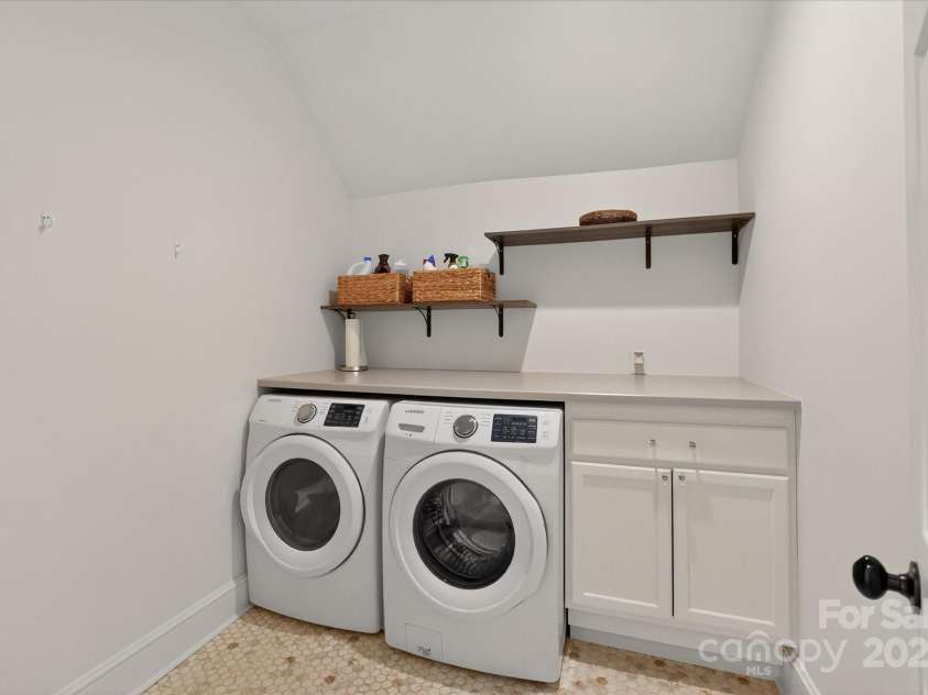 7007 Golden Rain Court, Charlotte, NC 28277.  MLS# CAR4288408, YatesRealty ID 30936. Spacious Laundry Room on the Upper Level