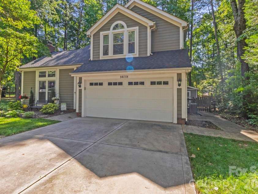 14018 Naworth Lane, Huntersville, NC 28078.  MLS# CAR4381106, YatesRealty ID 30939. Large driveway and no HOA so perfect for parking a boat or camper 