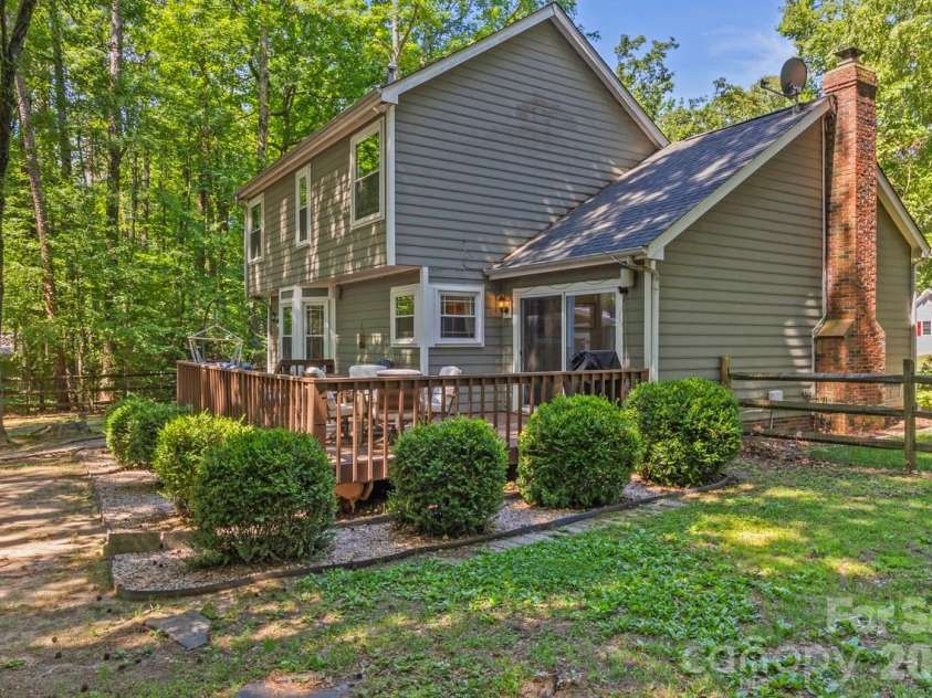 14018 Naworth Lane, Huntersville, NC 28078.  MLS# CAR4381106, YatesRealty ID 30939. The large, oversize deck is perfect for relaxing in the shade or gathering with friends and family