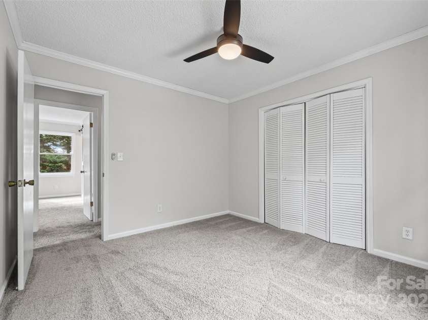 9111 Windjammer Drive, Tega Cay, SC 29708.  MLS# CAR4277508, YatesRealty ID 30939. Secondary bedroom 2