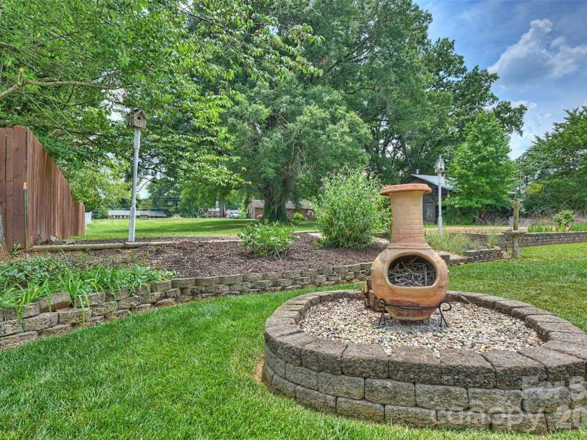 315 Wendover Drive, Locust, NC 28097.  MLS# CAR4391578, YatesRealty ID 30941. Firepit Area