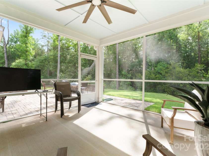 4008 Pinot Way, Fort Mill, SC 29707.  MLS# CAR4268803, YatesRealty ID 30944. Enjoy outdoor relaxation in your screened-in porch.