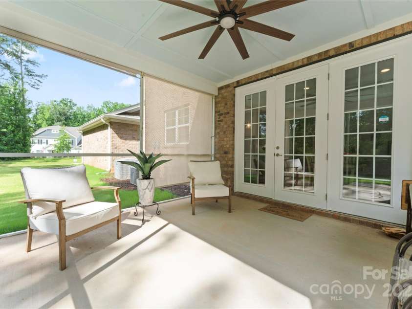 4008 Pinot Way, Fort Mill, SC 29707.  MLS# CAR4268803, YatesRealty ID 30944. Putt down shades and ceiling fan are perfect for those summer evenings.