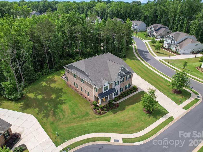 4008 Pinot Way, Fort Mill, SC 29707.  MLS# CAR4268803, YatesRealty ID 30944. This home sits on approximately one acre and you can enjoy the privacy of the woods behind the home.