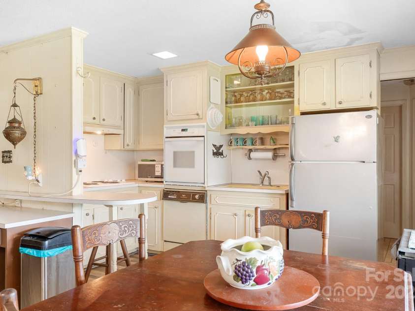 177 Brer Fox Trail, Troutman, NC 28166.  MLS# CAR4284185, YatesRealty ID 30946. Lower Level Kitchen