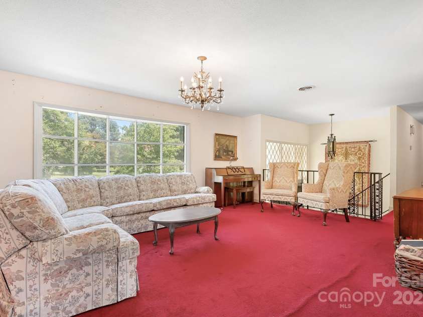 177 Brer Fox Trail, Troutman, NC 28166.  MLS# CAR4284185, YatesRealty ID 30946. Main level Living Room