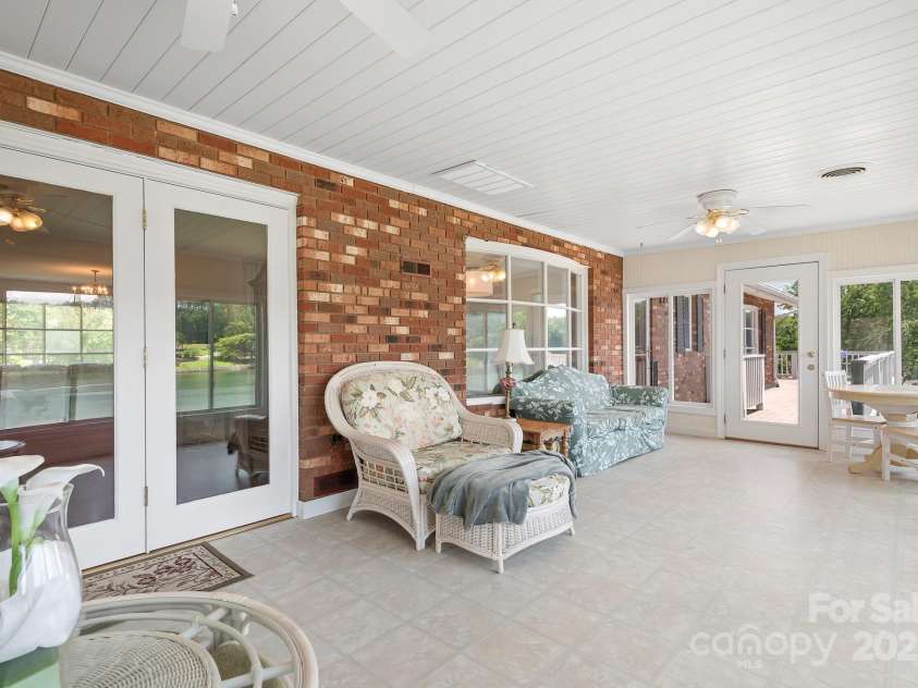 177 Brer Fox Trail, Troutman, NC 28166.  MLS# CAR4284185, YatesRealty ID 30946. Main level Sunroom