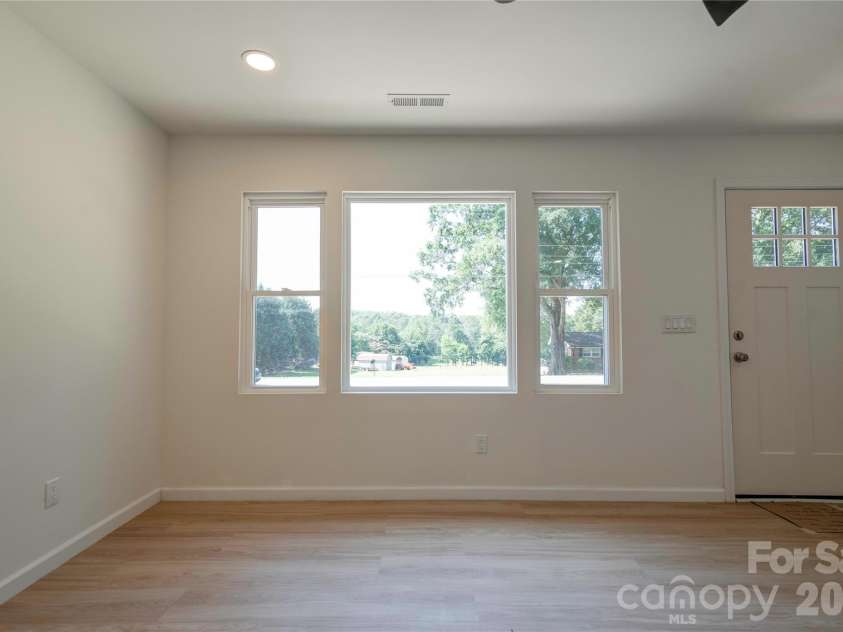 2994 Lutz Boulevard, Newton, NC 28658.  MLS# CAR4392327, YatesRealty ID 30949. Living Room, Front Entry door