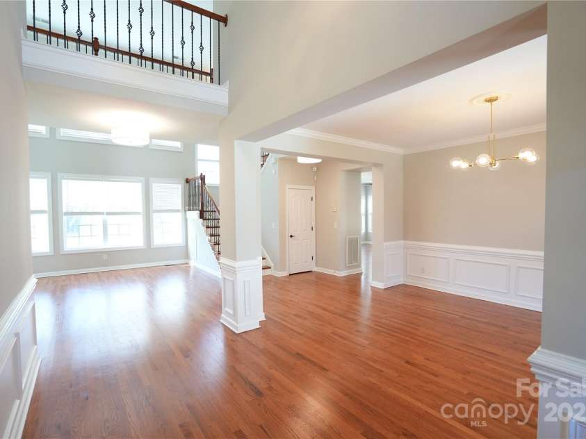 664 Vega Street, Concord, NC 28027.  MLS# CAR4239183, YatesRealty ID 3095. Two story foyer opens to Dining and Great room.
