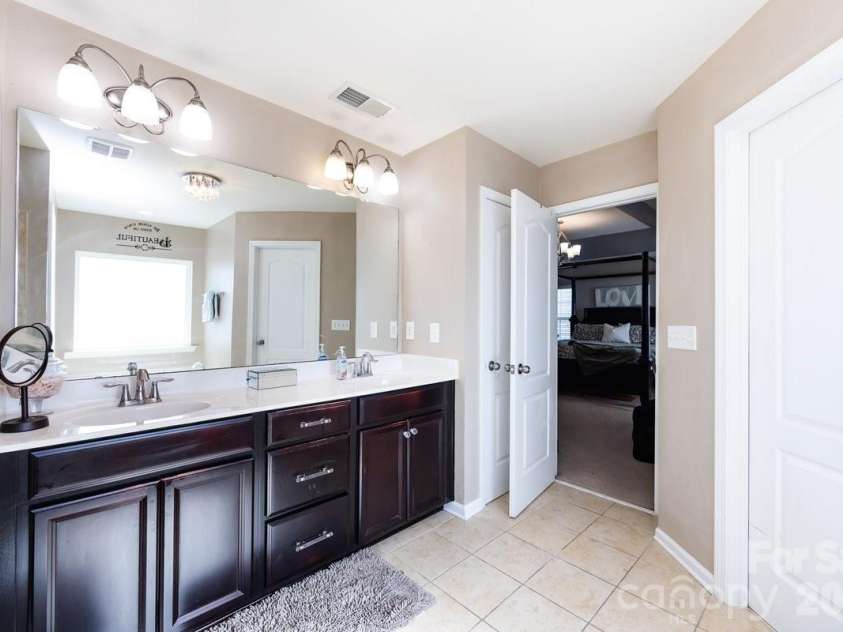 8931 Happiness Road, Harrisburg, NC 28075.  MLS# CAR4331689, YatesRealty ID 3095. Primary Bath