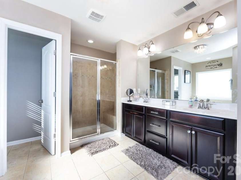 8931 Happiness Road, Harrisburg, NC 28075.  MLS# CAR4331689, YatesRealty ID 3095. Primary Bath