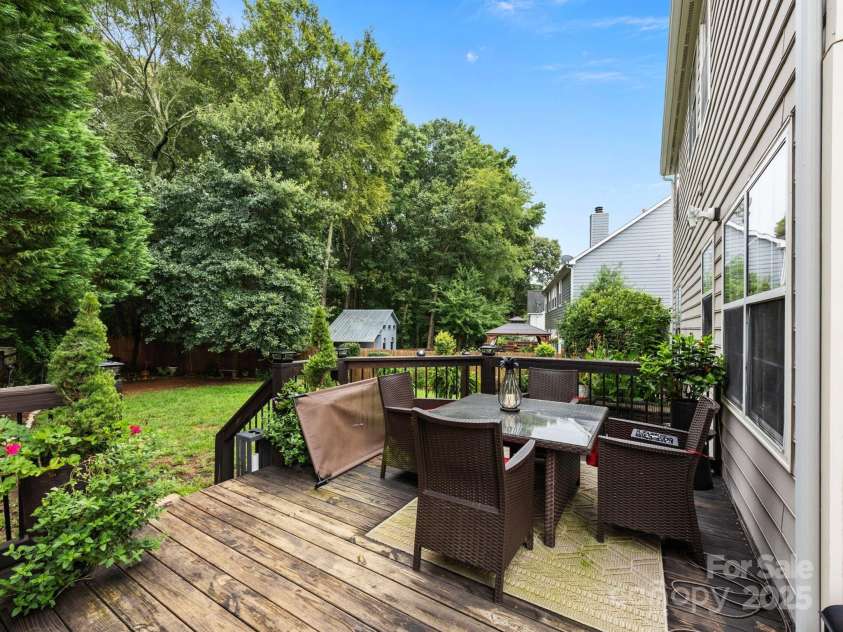 2919 Redfield Drive, Charlotte, NC 28270.  MLS# CAR4284513, YatesRealty ID 30950. Deck Left Side