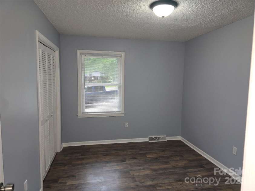 1660 Songwood Road, Concord, NC 28025.  MLS# CAR4268086, YatesRealty ID 30952. 1st main level bedroom