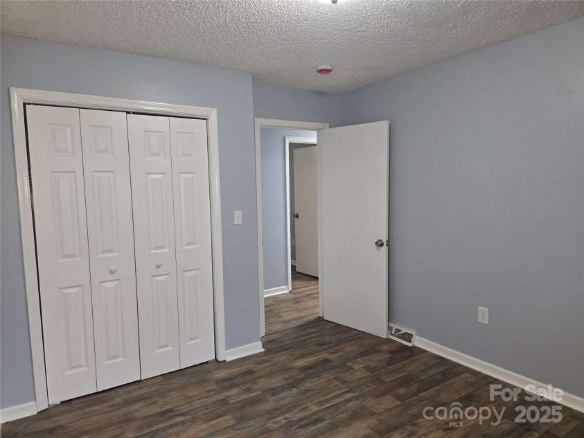 1660 Songwood Road, Concord, NC 28025.  MLS# CAR4268086, YatesRealty ID 30952. 2nd main level bedroom