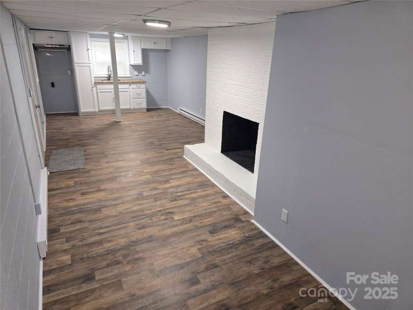 1660 Songwood Road, Concord, NC 28025.  MLS# CAR4268086, YatesRealty ID 30952. Basement living area