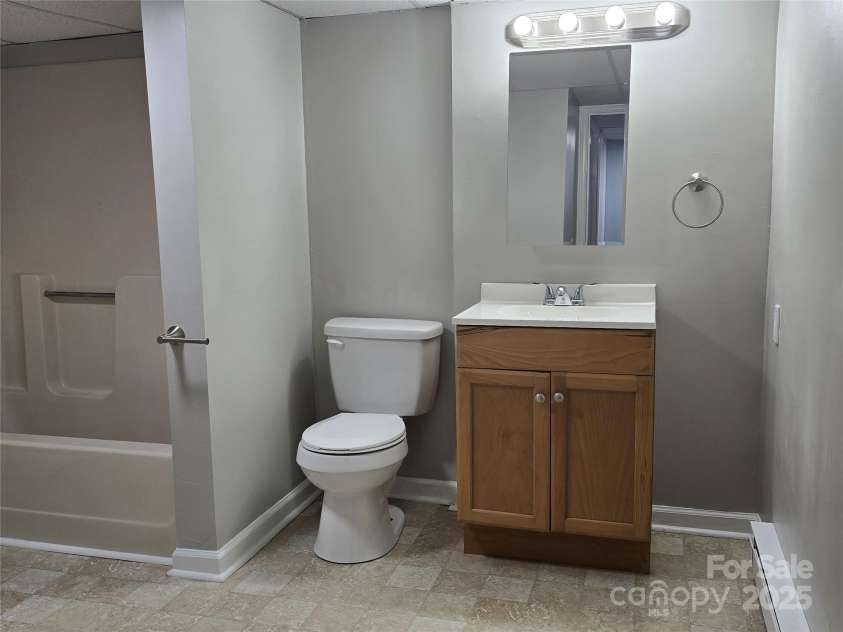 1660 Songwood Road, Concord, NC 28025.  MLS# CAR4268086, YatesRealty ID 30952. Large basement bathroom