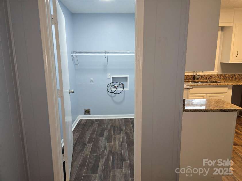 1660 Songwood Road, Concord, NC 28025.  MLS# CAR4268086, YatesRealty ID 30952. Laundry room