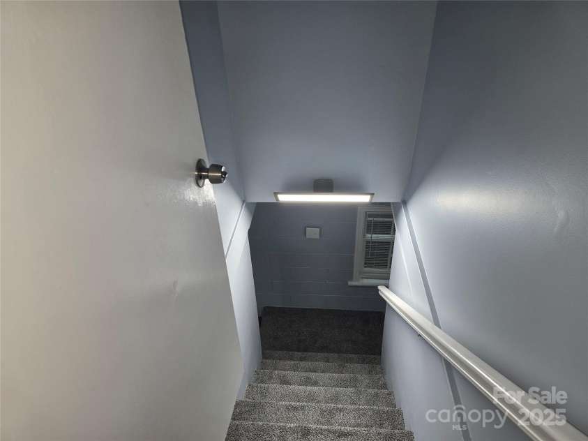 1660 Songwood Road, Concord, NC 28025.  MLS# CAR4268086, YatesRealty ID 30952. Stairs to basement