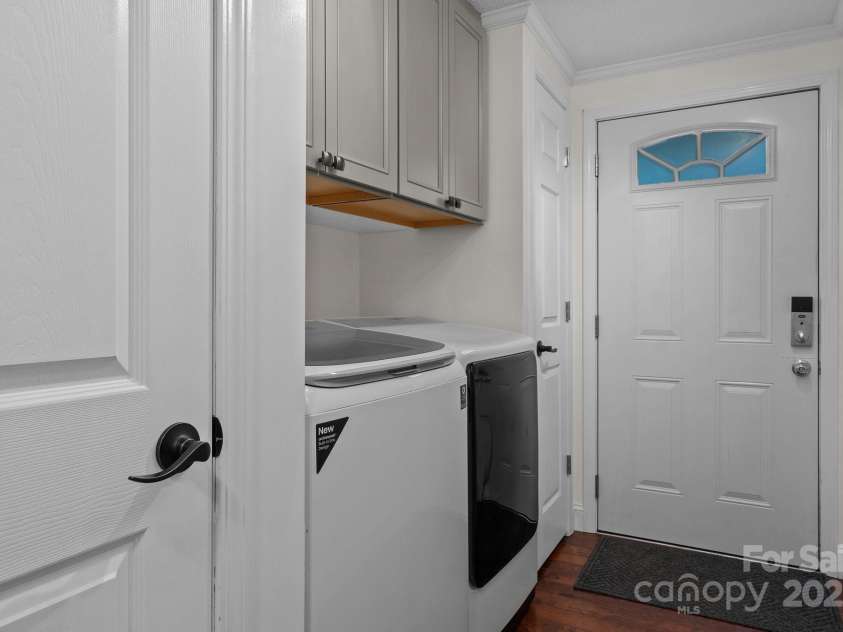 34 Edwards Street, Asheville, NC 28806.  MLS# CAR4268192, YatesRealty ID 30954. Laundry Room that closes off from the house and has a door to the back yard.