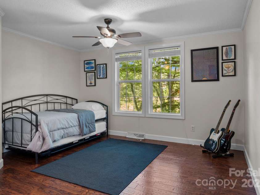 34 Edwards Street, Asheville, NC 28806.  MLS# CAR4268192, YatesRealty ID 30954. On the opposite side of the house from the Primary Suite are the other two bedrooms.