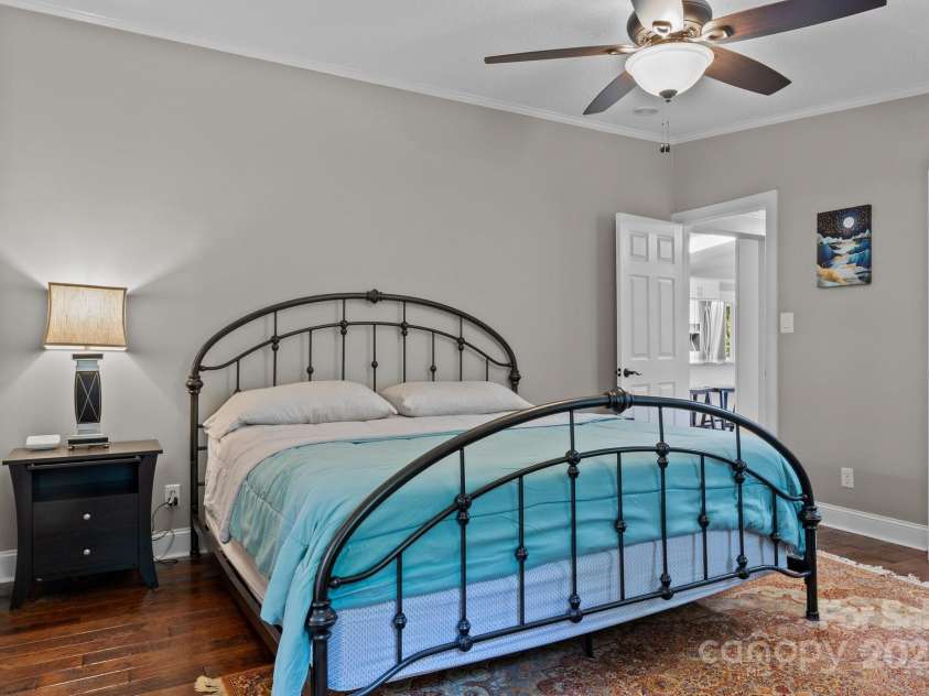 34 Edwards Street, Asheville, NC 28806.  MLS# CAR4268192, YatesRealty ID 30954. Primary bedroom; queen size bed noted here.