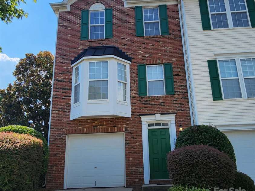 10205 Garrett Grigg Road, Charlotte, NC 28262.  MLS# CAR4277791, YatesRealty ID 30957. 3-story Townhome with garage