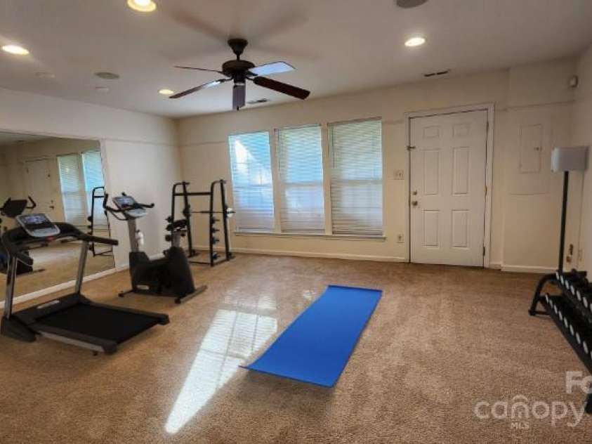 10205 Garrett Grigg Road, Charlotte, NC 28262.  MLS# CAR4277791, YatesRealty ID 30957. Bonus room staged for exercise room-Many other options!