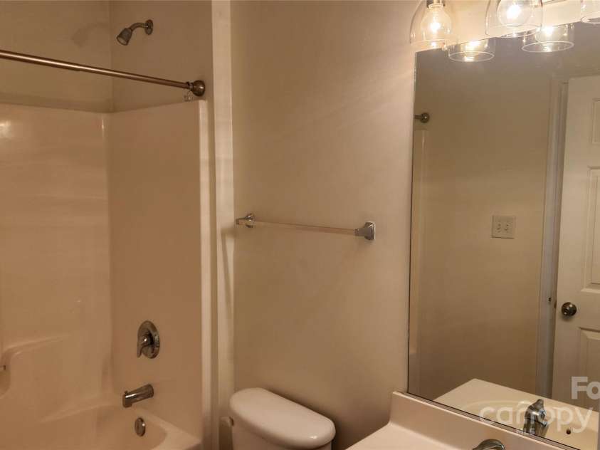 10205 Garrett Grigg Road, Charlotte, NC 28262.  MLS# CAR4277791, YatesRealty ID 30957. Hall/2nd Bedroom Bath