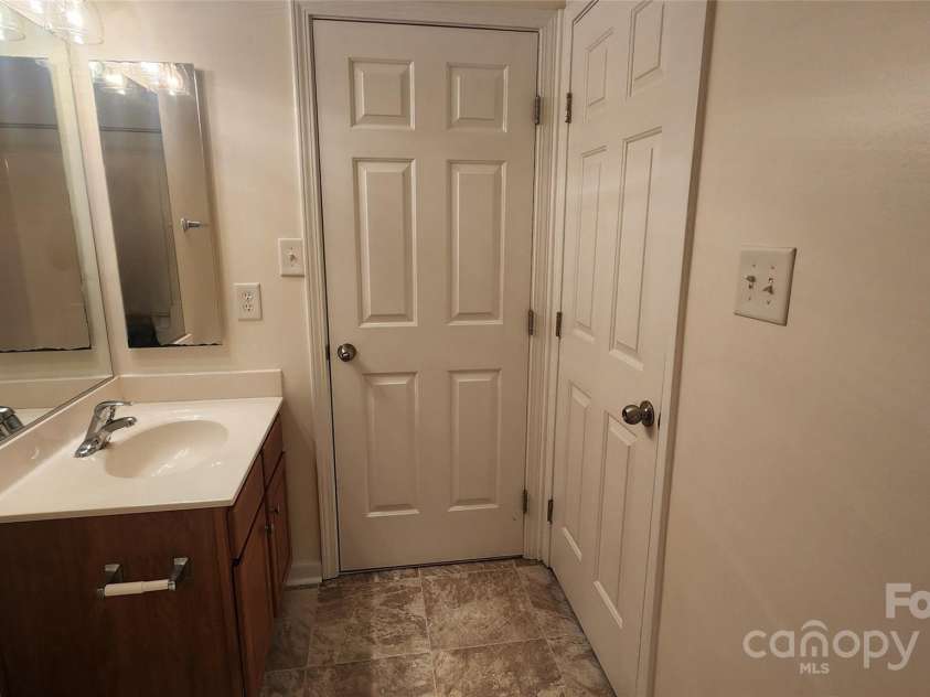 10205 Garrett Grigg Road, Charlotte, NC 28262.  MLS# CAR4277791, YatesRealty ID 30957. Hall/2nd bedroom bath