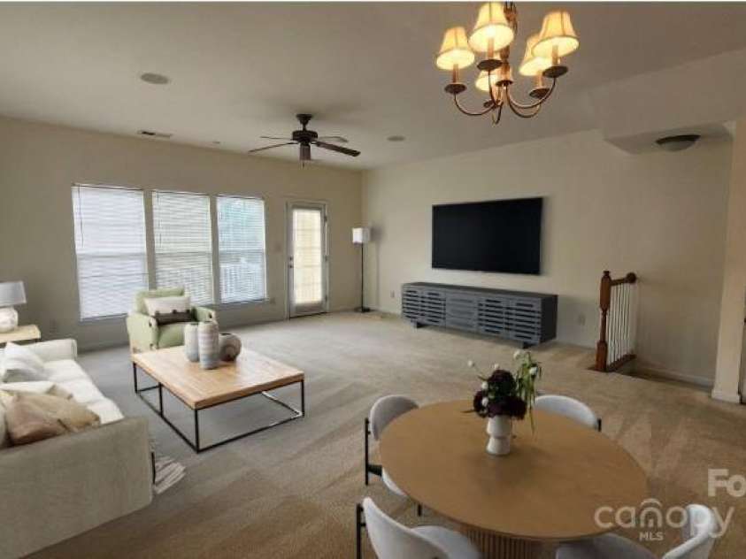 10205 Garrett Grigg Road, Charlotte, NC 28262.  MLS# CAR4277791, YatesRealty ID 30957. Living Room Virtually Staged